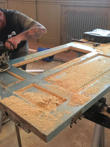 Carpenter finishing a woodwork project
