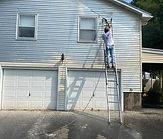 Close-up of aluminum siding surface preparation